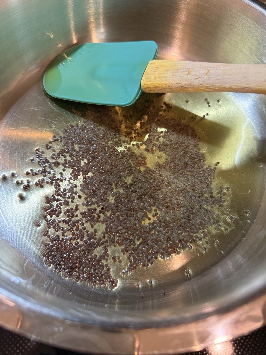 Mustard seeds popping in ghee