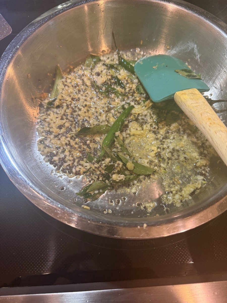 Ginger garlic and curry leaves sizzling